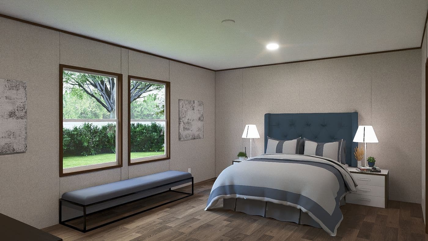 The SPRUCE Primary Bedroom. This Manufactured Mobile Home features 3 bedrooms and 2 baths.