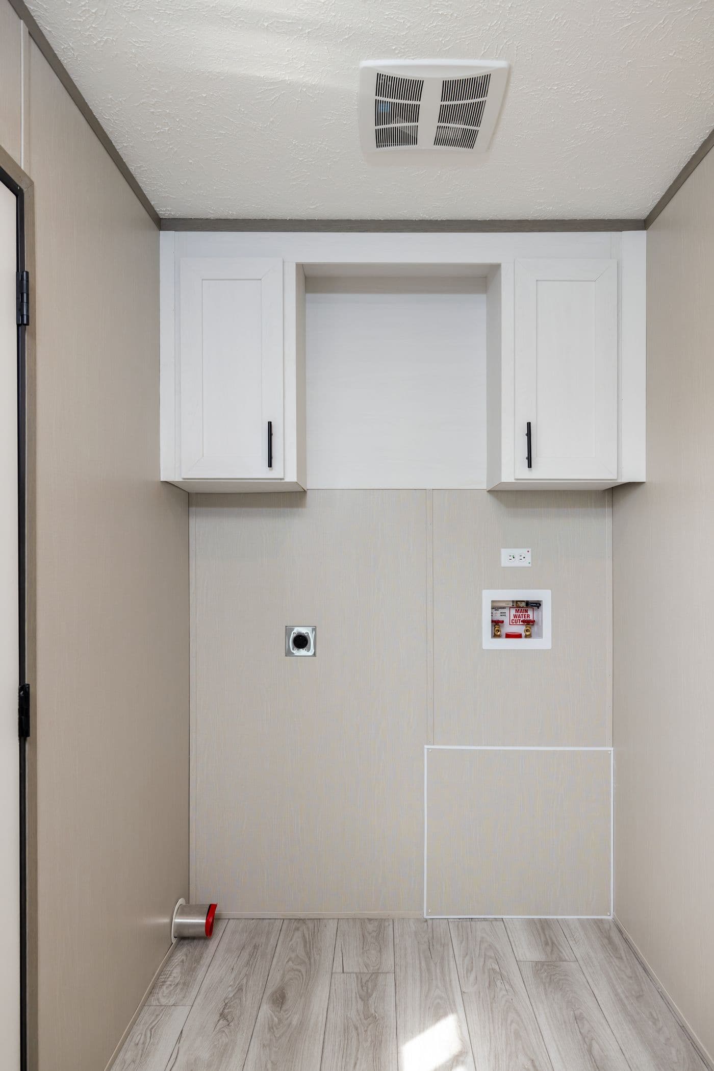 The SHOWER HOUSE Utility Room. This Manufactured Mobile Home features 3 bedrooms and 2 baths.