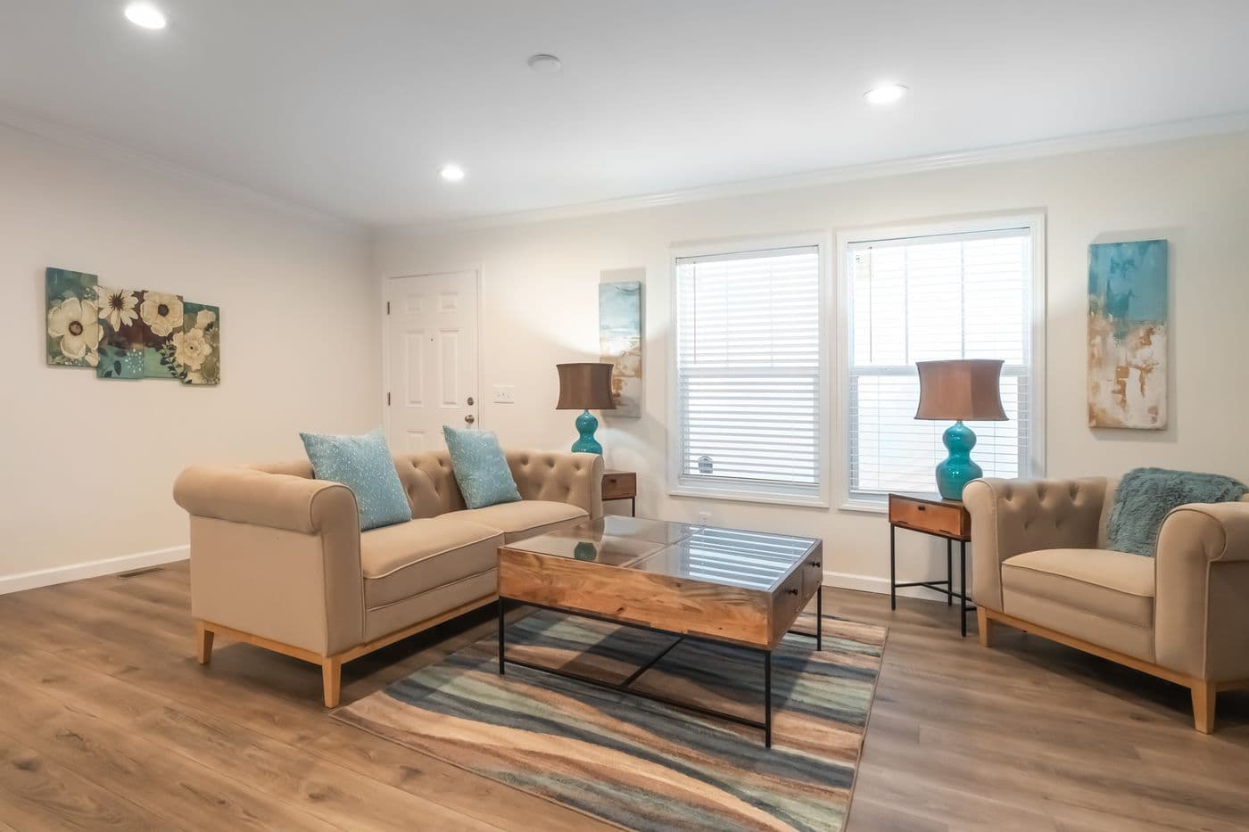 The 4210 "CAROLINA" 5628 Living Room. This Manufactured Mobile Home features 3 bedrooms and 2 baths.