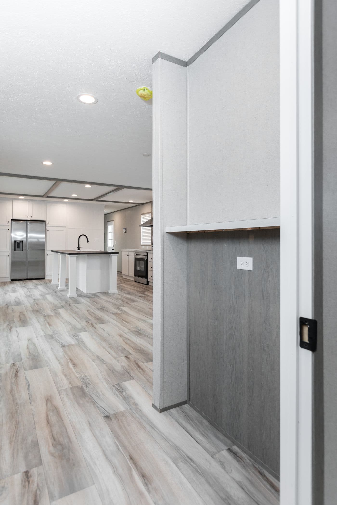 The PLATINUM ANNIVERSARY Foyer. This Manufactured Mobile Home features 3 bedrooms and 2 baths.