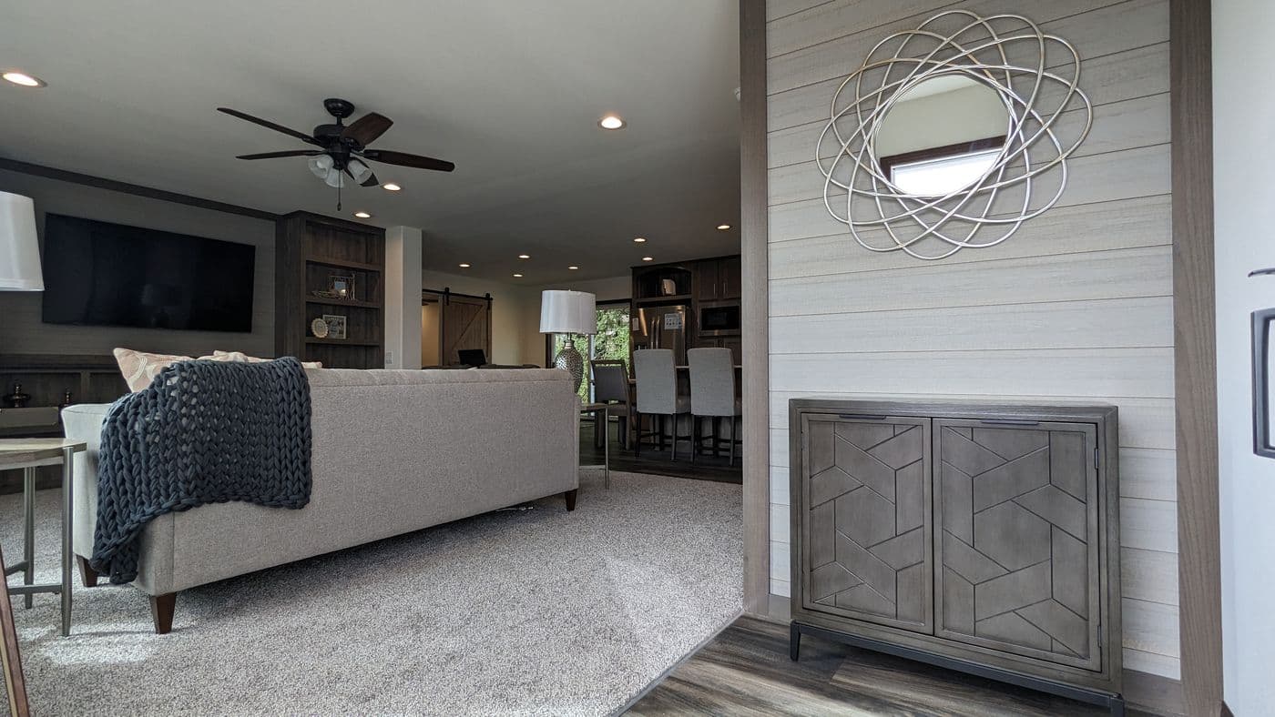 The LEGEND 327-1 Living Room. This Manufactured Mobile Home features 3 bedrooms and 2 baths.