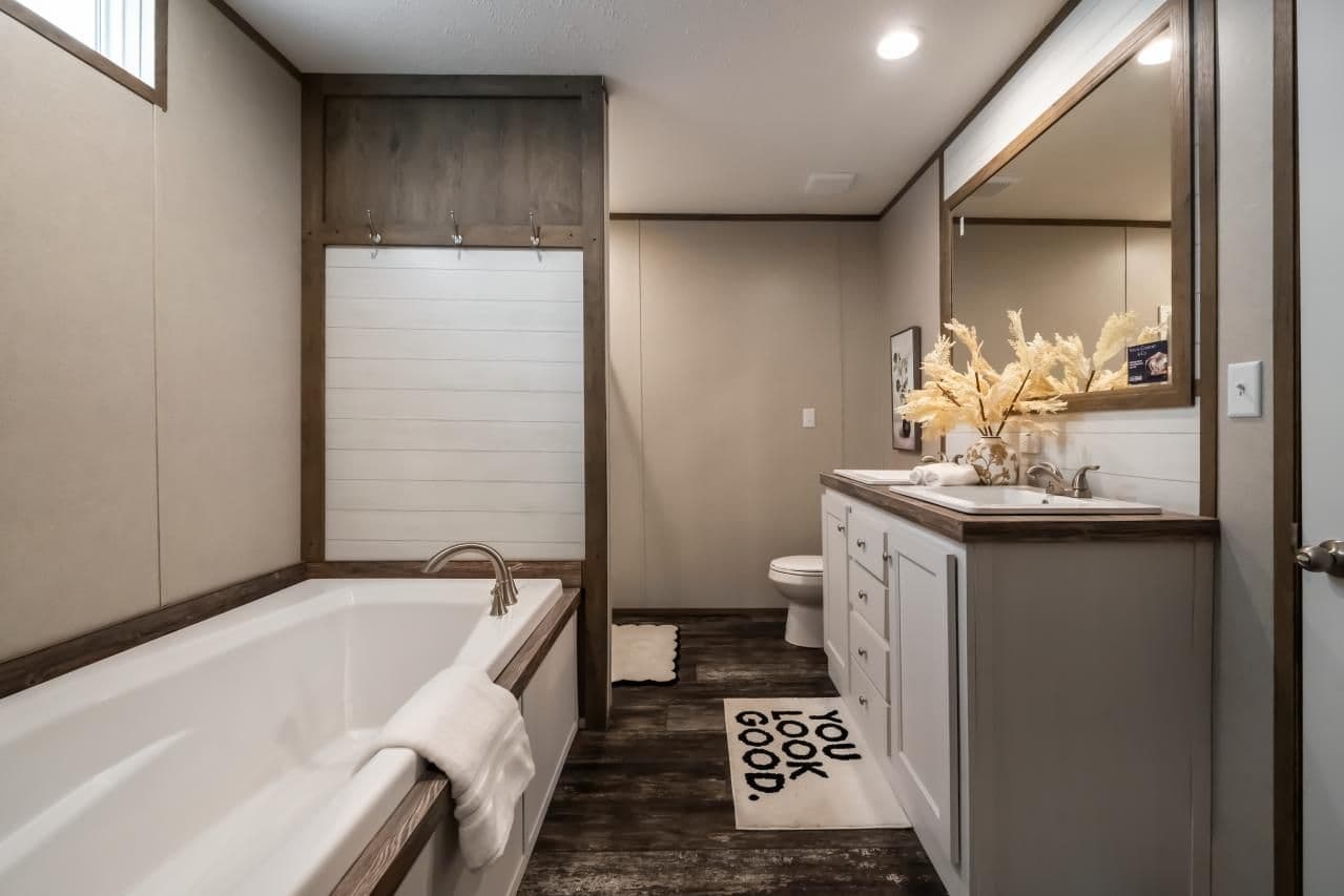 The ANNIVERSARY ENTERTAINER Exterior. This Manufactured Mobile Home features 3 bedrooms and 2 baths.