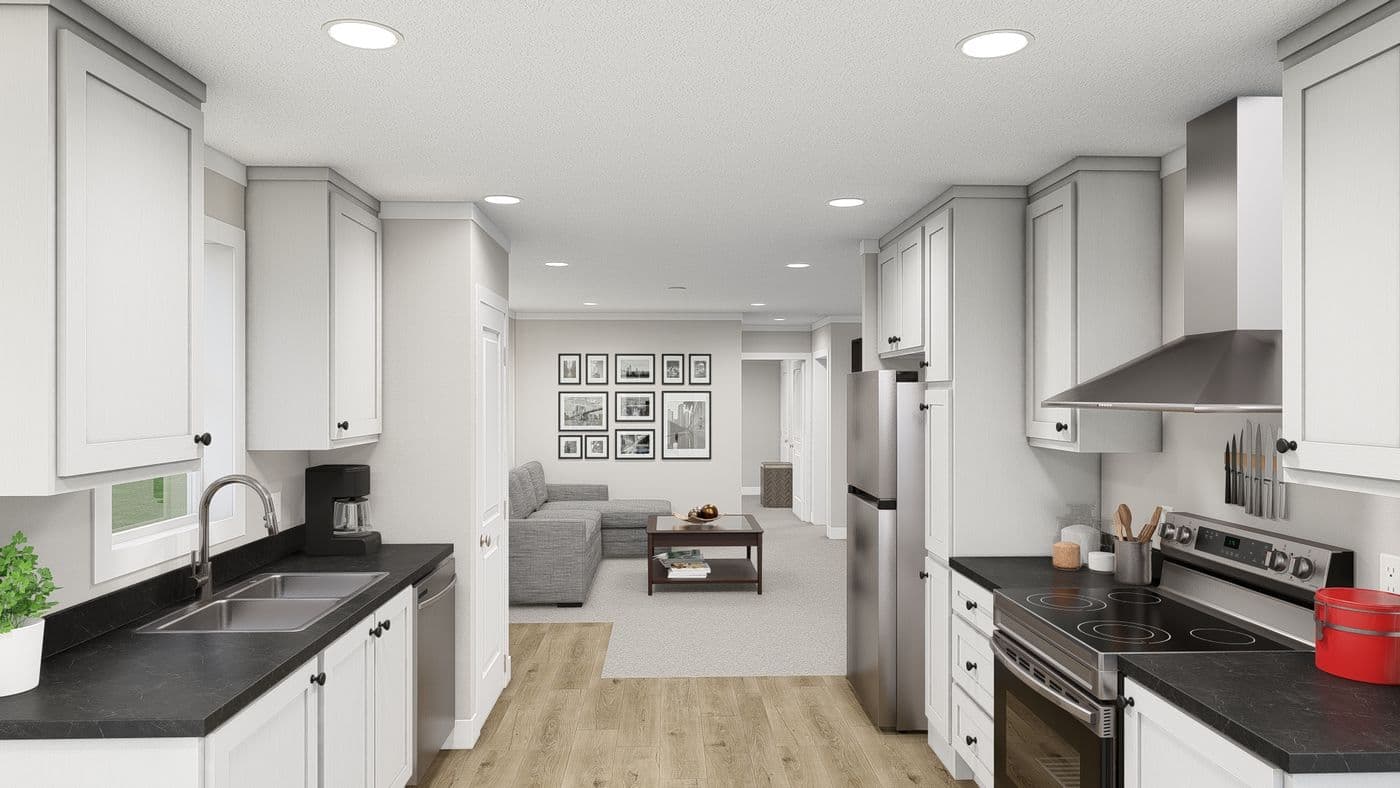 The HERE COMES THE SUN Kitchen. This Manufactured Mobile Home features 3 bedrooms and 2 baths.