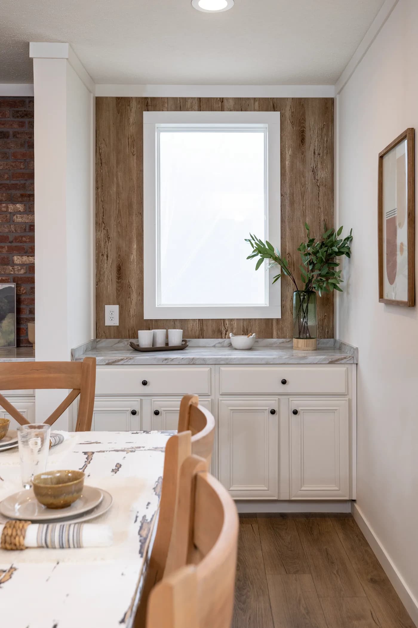 The THE ANNA FAE Dining Room. This Manufactured Mobile Home features 3 bedrooms and 2 baths.