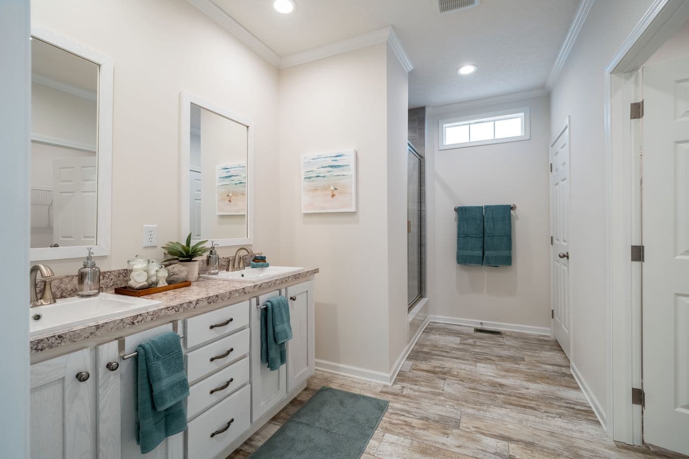 The 2889 THE COTTAGE HUD Primary Bathroom. This Manufactured Mobile Home features 3 bedrooms and 2 baths.