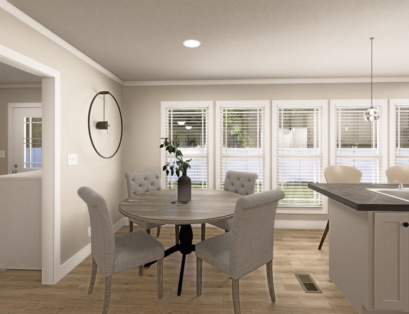The CLASSIC 60B Dining Area. This Manufactured Mobile Home features 3 bedrooms and 2 baths.