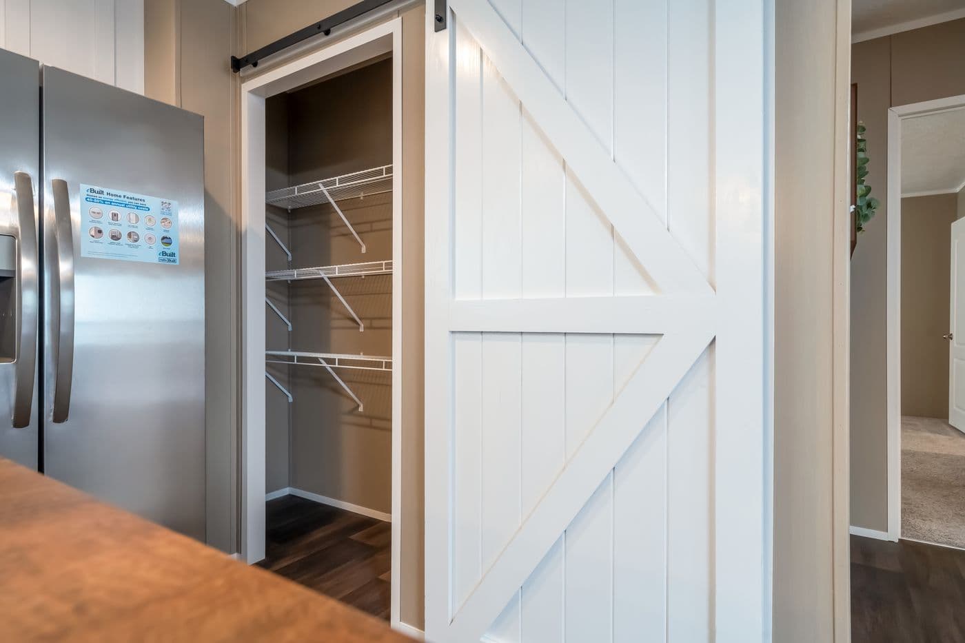 The ISLAND BREEZE 64 Kitchen. This Manufactured Mobile Home features 4 bedrooms and 2 baths.
