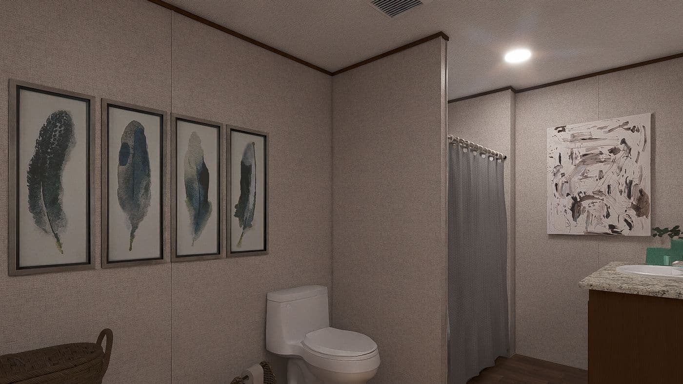 The REDWOOD Primary Bathroom. This Manufactured Mobile Home features 5 bedrooms and 3 baths.