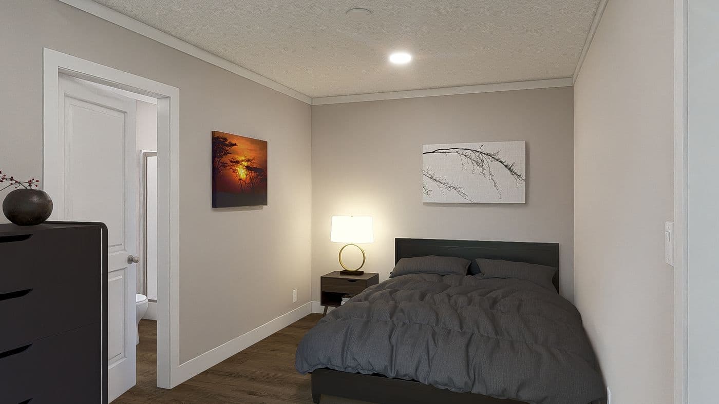 The RHYTHM NATION Primary Bedroom. This Manufactured Mobile Home features 3 bedrooms and 2 baths.
