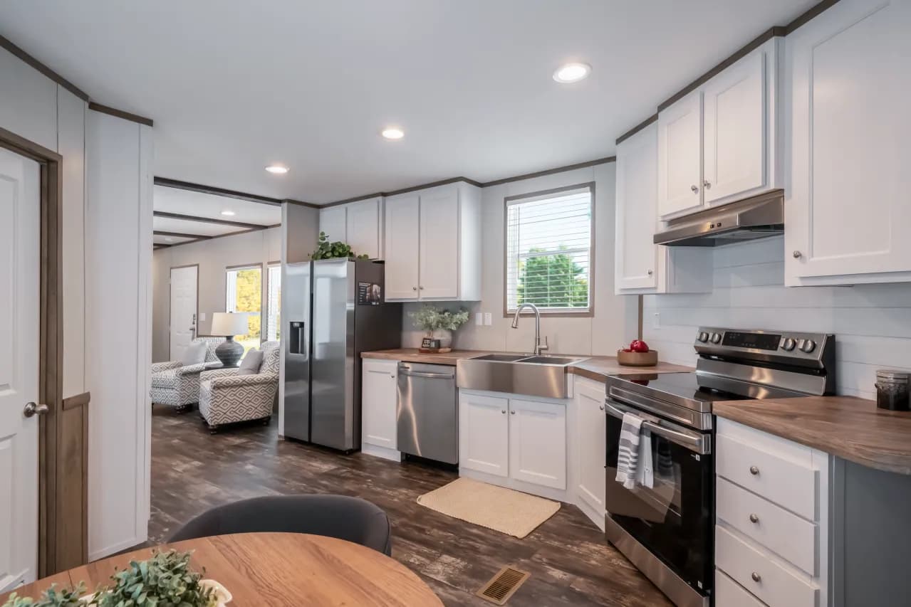 The ANNIVERSARY ENTERTAINER Exterior. This Manufactured Mobile Home features 3 bedrooms and 2 baths.