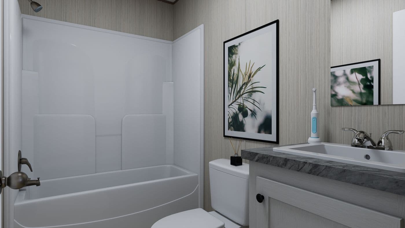 The FOOTHILLS 76 Guest Bathroom. This Manufactured Mobile Home features 3 bedrooms and 2 baths.