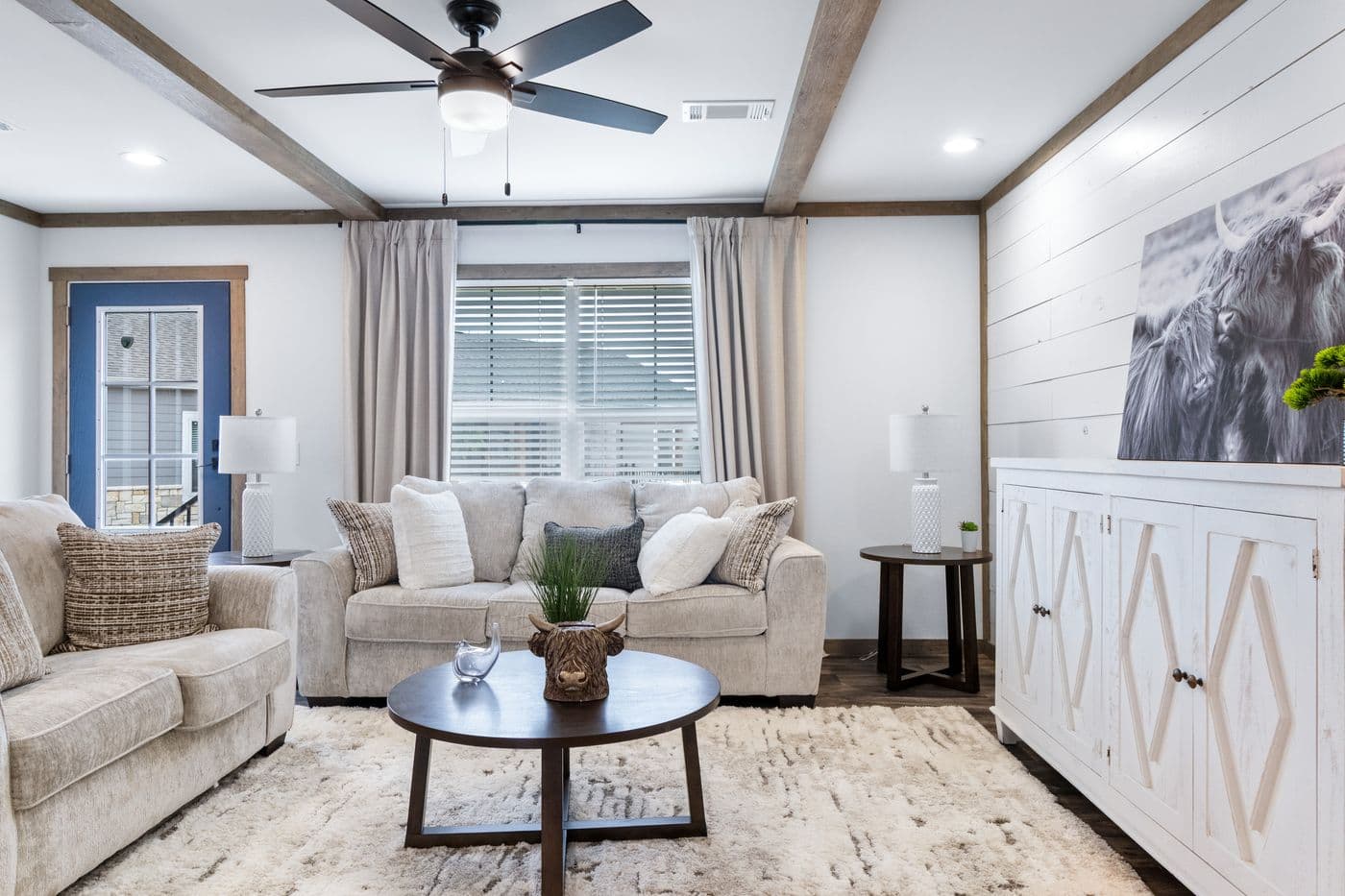 The SAWYER ELITE Living Room. This Manufactured Mobile Home features 3 bedrooms and 2 baths.
