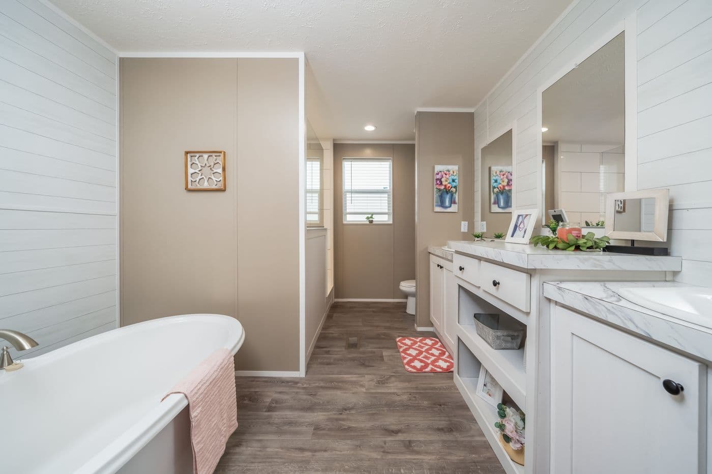 The ISLAND BREEZE Primary Bathroom. This Manufactured Mobile Home features 3 bedrooms and 2 baths.