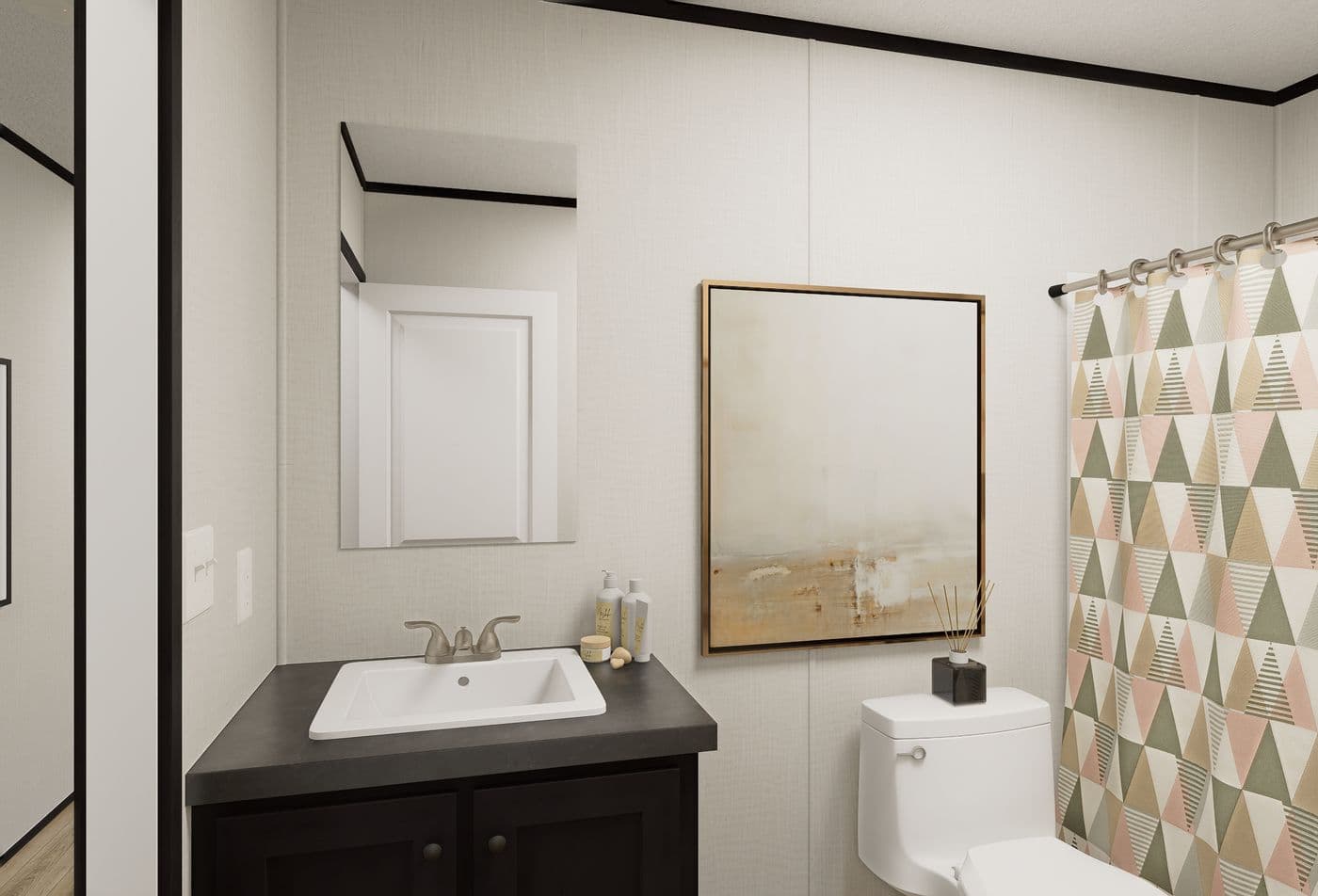 The ECLIPSE Guest Bathroom. This Manufactured Mobile Home features 4 bedrooms and 2 baths.