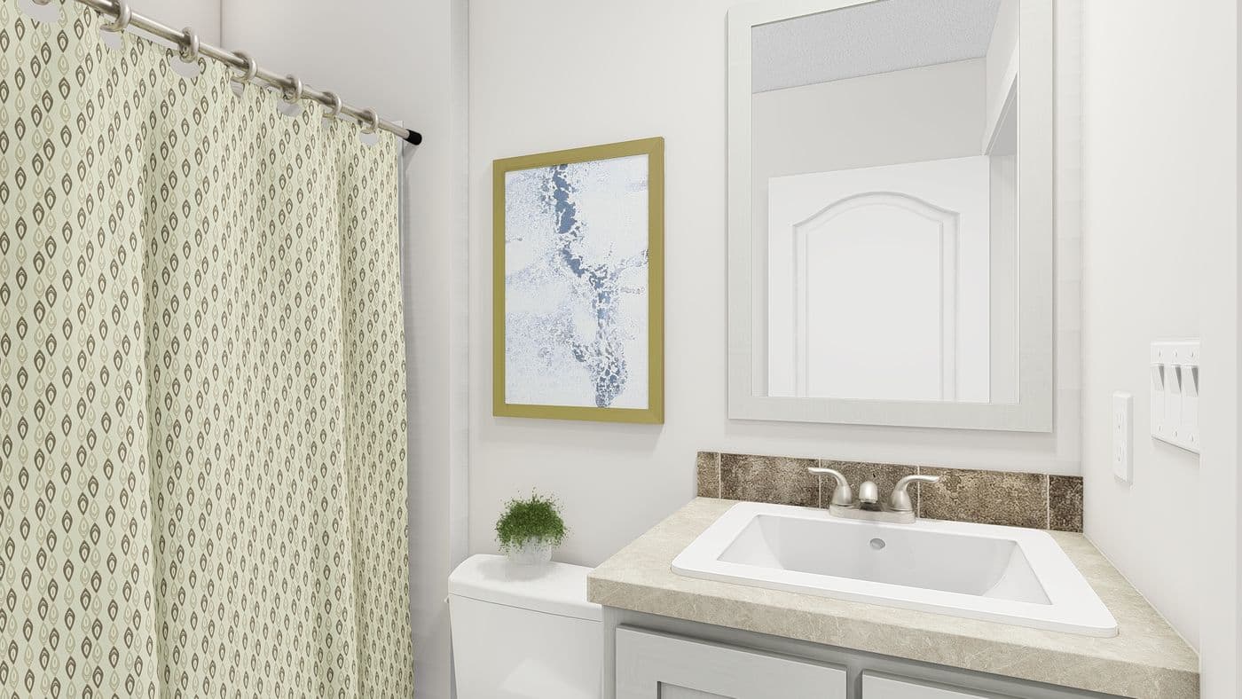 The RAMSEY 207-1 Guest Bathroom. This Manufactured Mobile Home features 3 bedrooms and 2 baths.