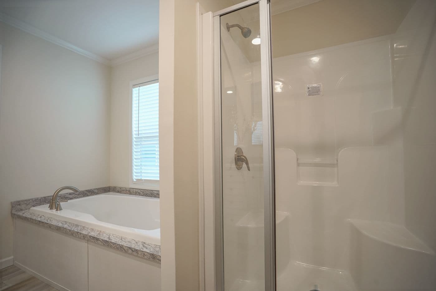 The 777-2 "COOL BREEZE" 7616 Primary Bathroom. This Manufactured Mobile Home features 3 bedrooms and 2 baths.