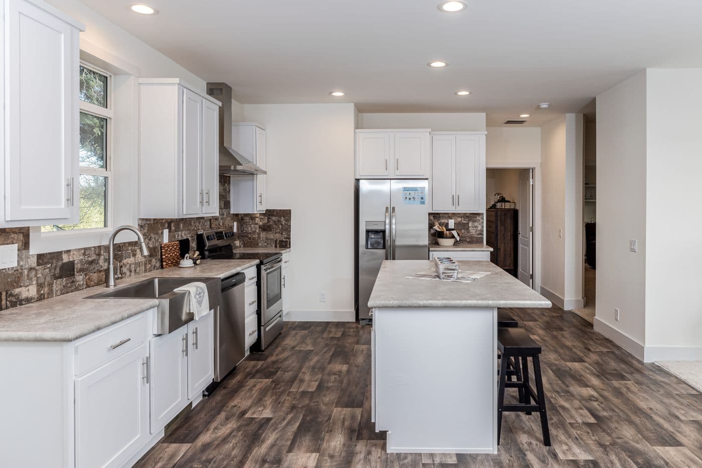 The 50TH ANNIVERSARY Exterior. This Manufactured Mobile Home features 3 bedrooms and 2 baths.