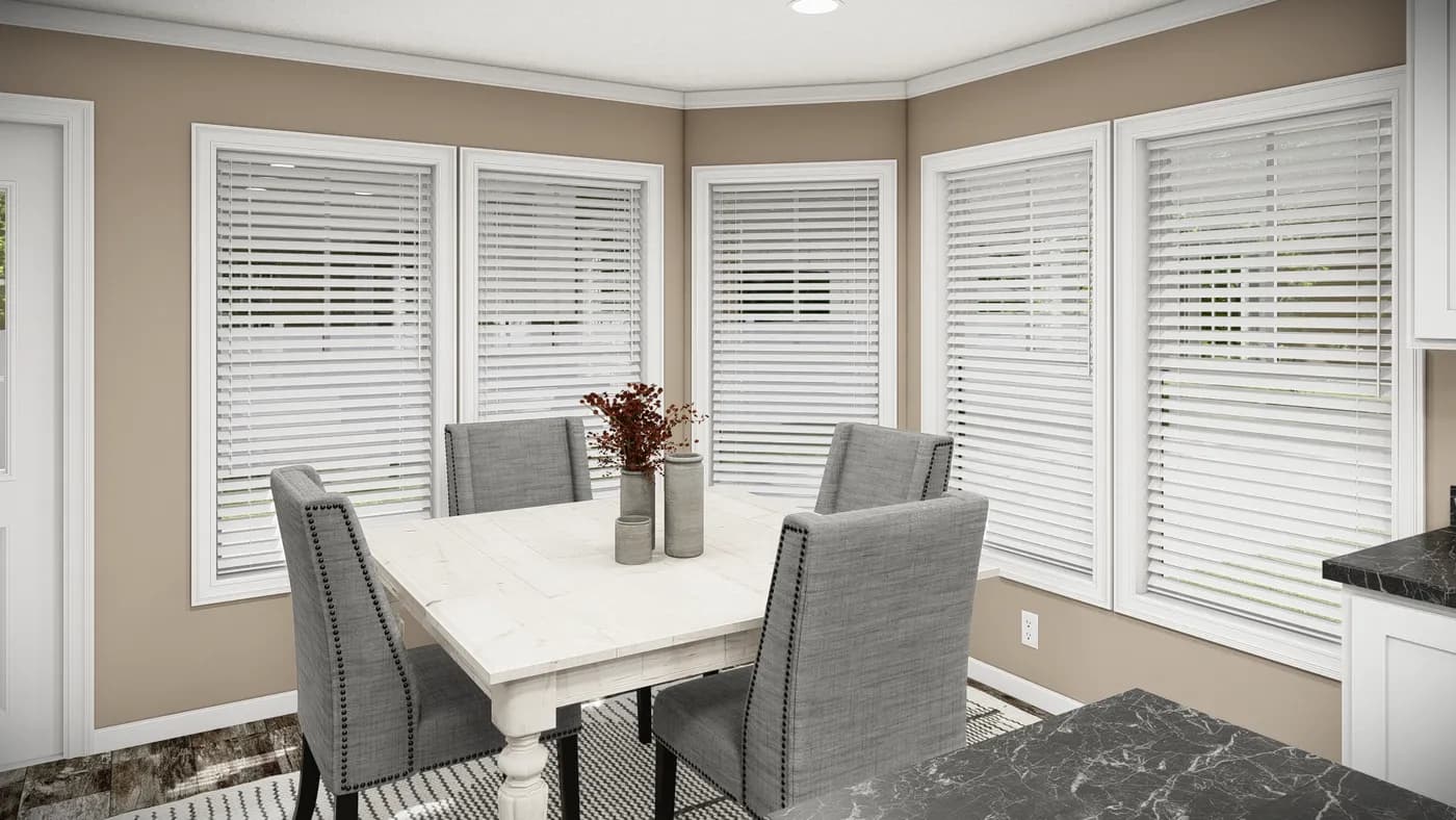 The THE MAVERICK Dining Area. This Manufactured Mobile Home features 3 bedrooms and 2 baths.