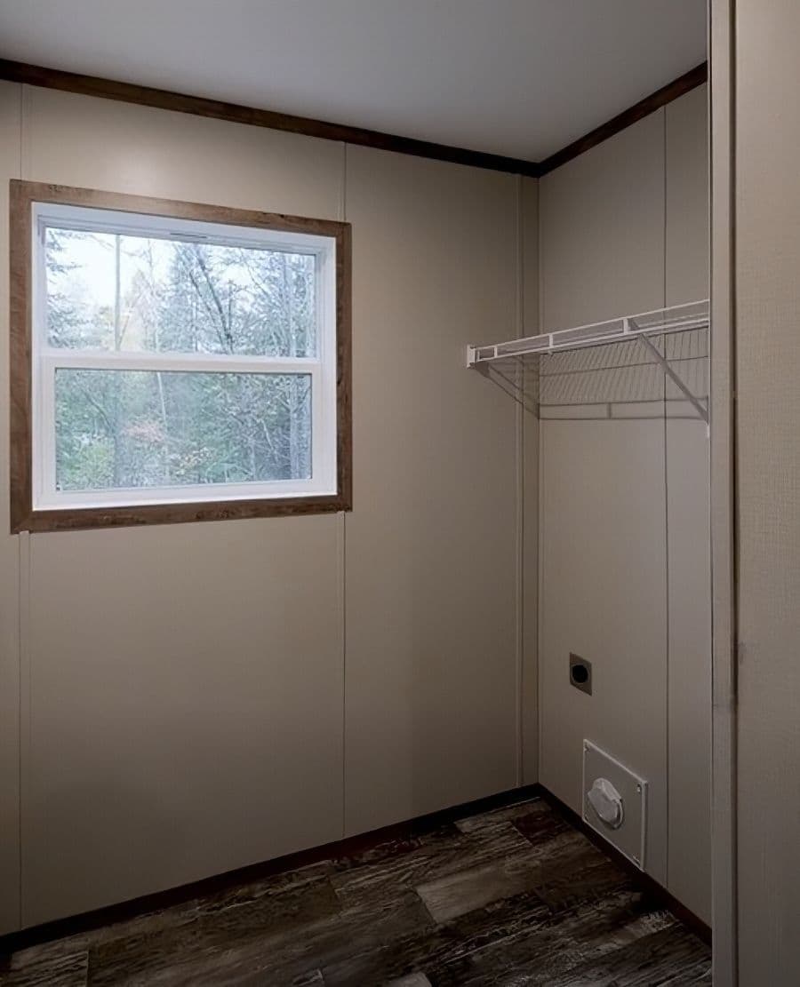 The PERIDOT Utility Room. This Manufactured Mobile Home features 2 bedrooms and 1 bath.