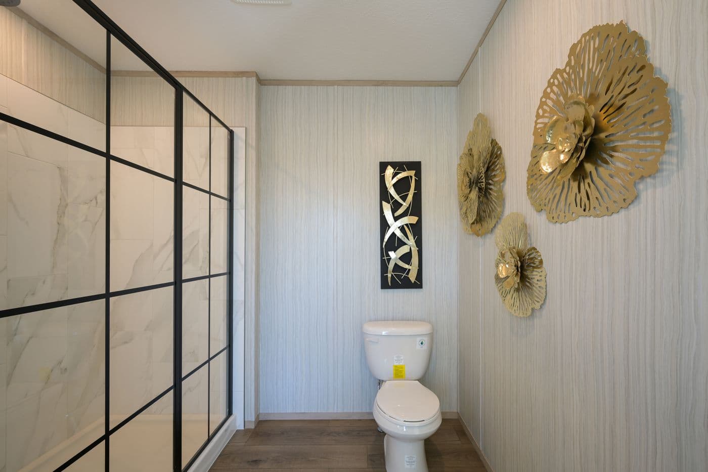 The TIGER'S EYE 7416-456 Primary Bathroom. This Manufactured Mobile Home features 3 bedrooms and 2 baths.