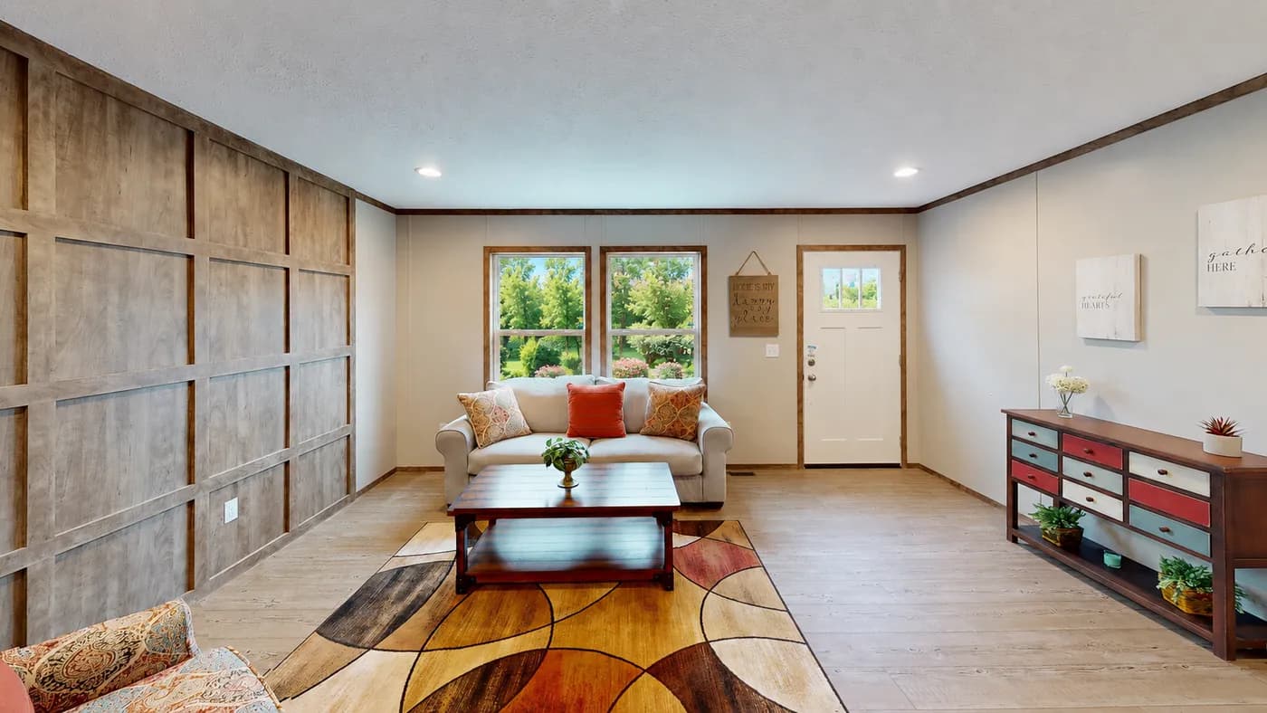 The BOONE Living Room. This Manufactured Mobile Home features 4 bedrooms and 2 baths.