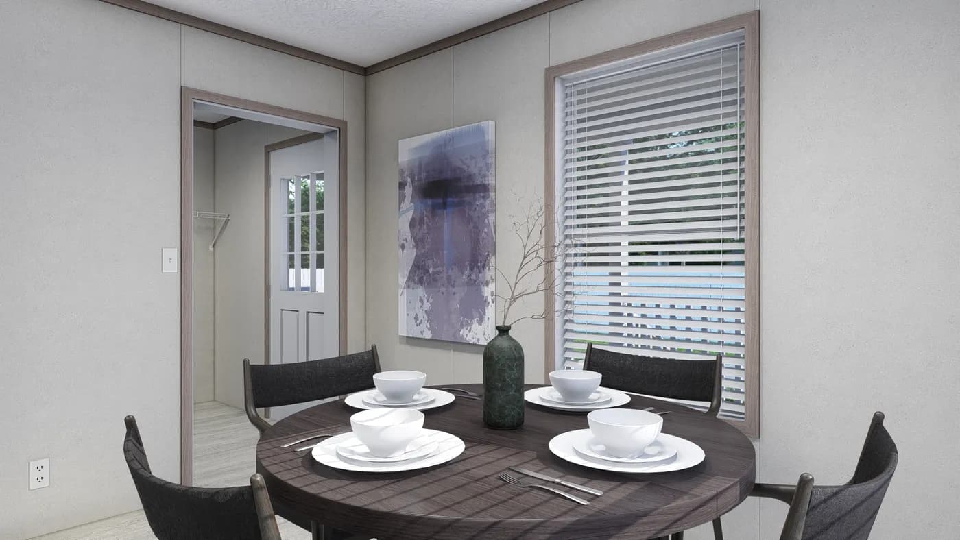 The 5624-E734P THE PULSE Dining Area. This Manufactured Mobile Home features 3 bedrooms and 2 baths.