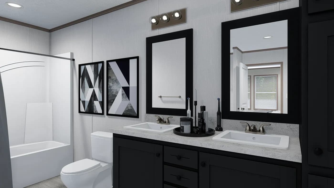The 6428-E792 THE PULSE Primary Bathroom. This Manufactured Mobile Home features 3 bedrooms and 2.5 baths.