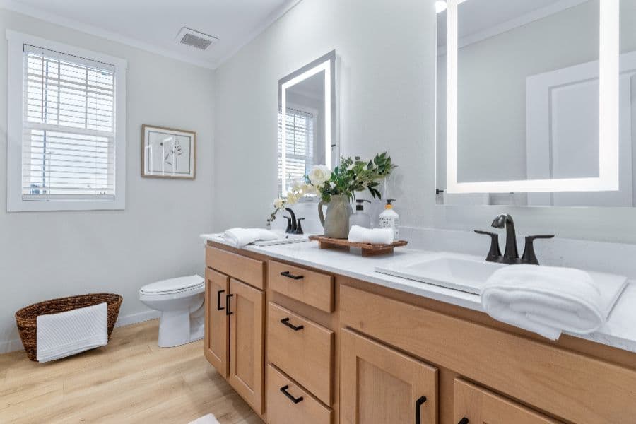 The THE ARCHIBALD Guest Bathroom. This Manufactured Mobile Home features 4 bedrooms and 2 baths.