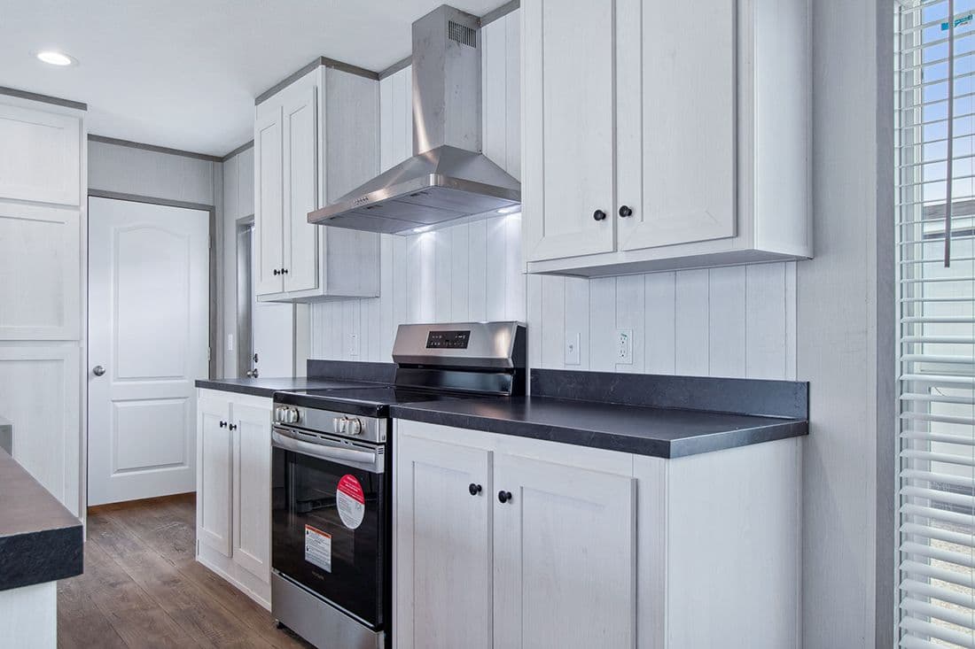 The RESOLUTION 16682X Kitchen. This Manufactured Mobile Home features 2 bedrooms and 2 baths.