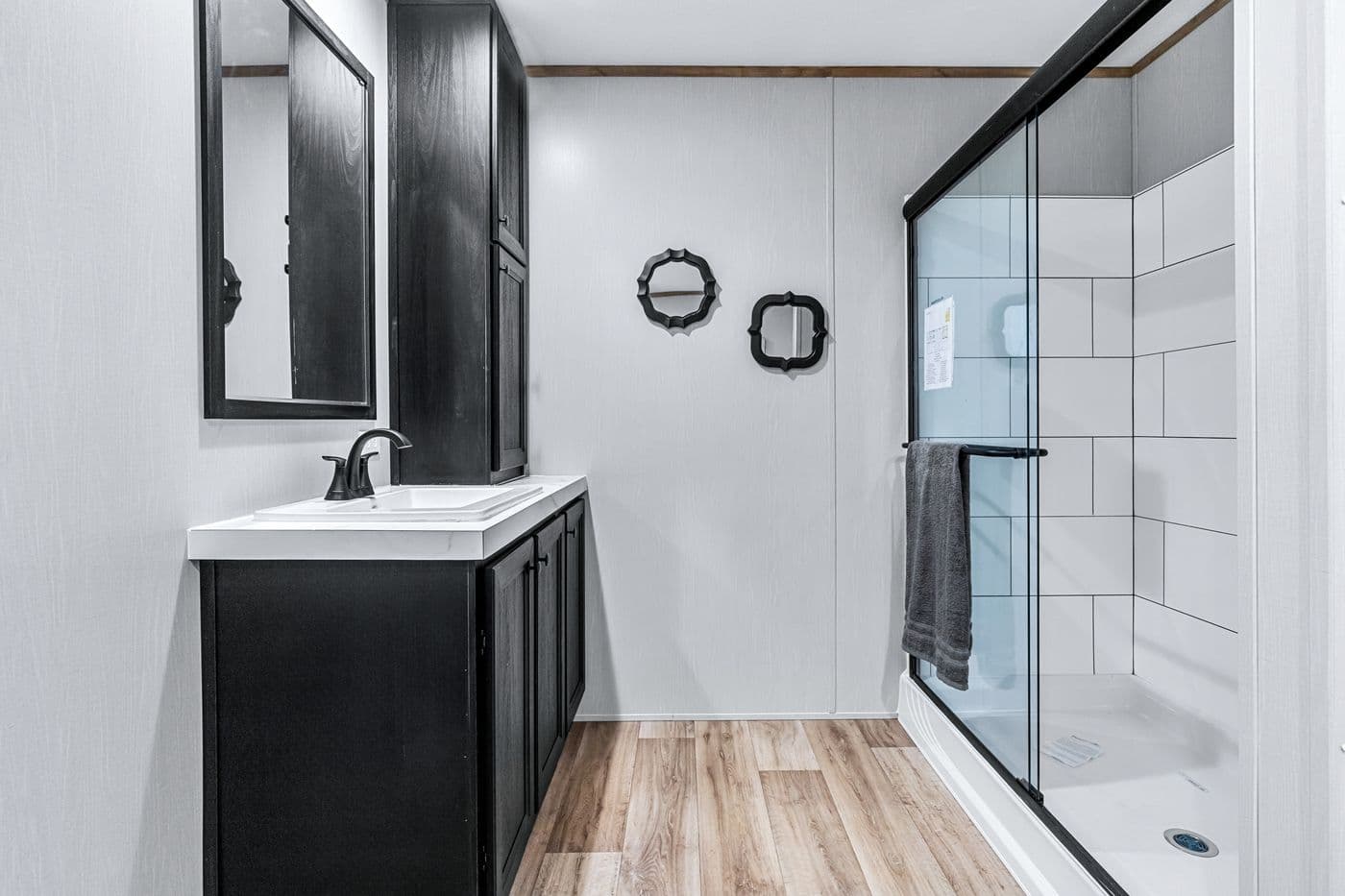 The ANATOLIA Primary Bathroom. This Manufactured Mobile Home features 3 bedrooms and 2 baths.