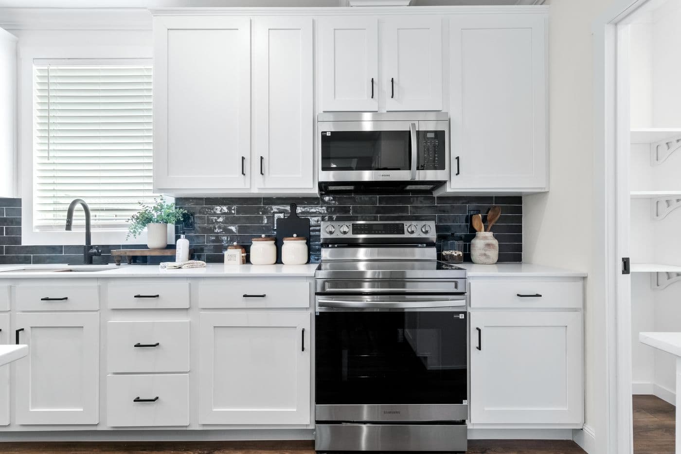 The THE IRON PEAK Kitchen. This Manufactured Mobile Home features 4 bedrooms and 2 baths.