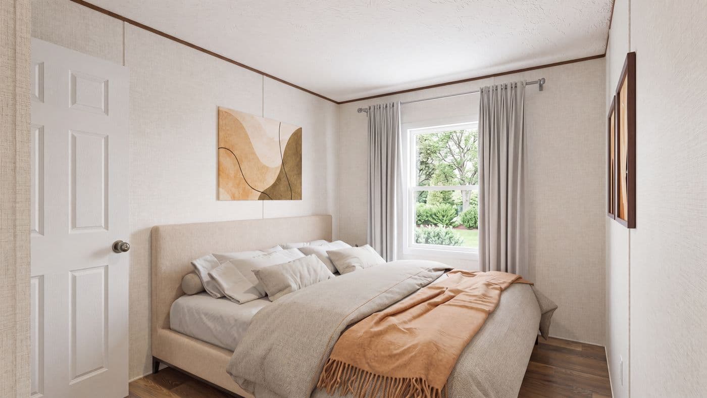 The OAK Bedroom. This Manufactured Mobile Home features 4 bedrooms and 2 baths.