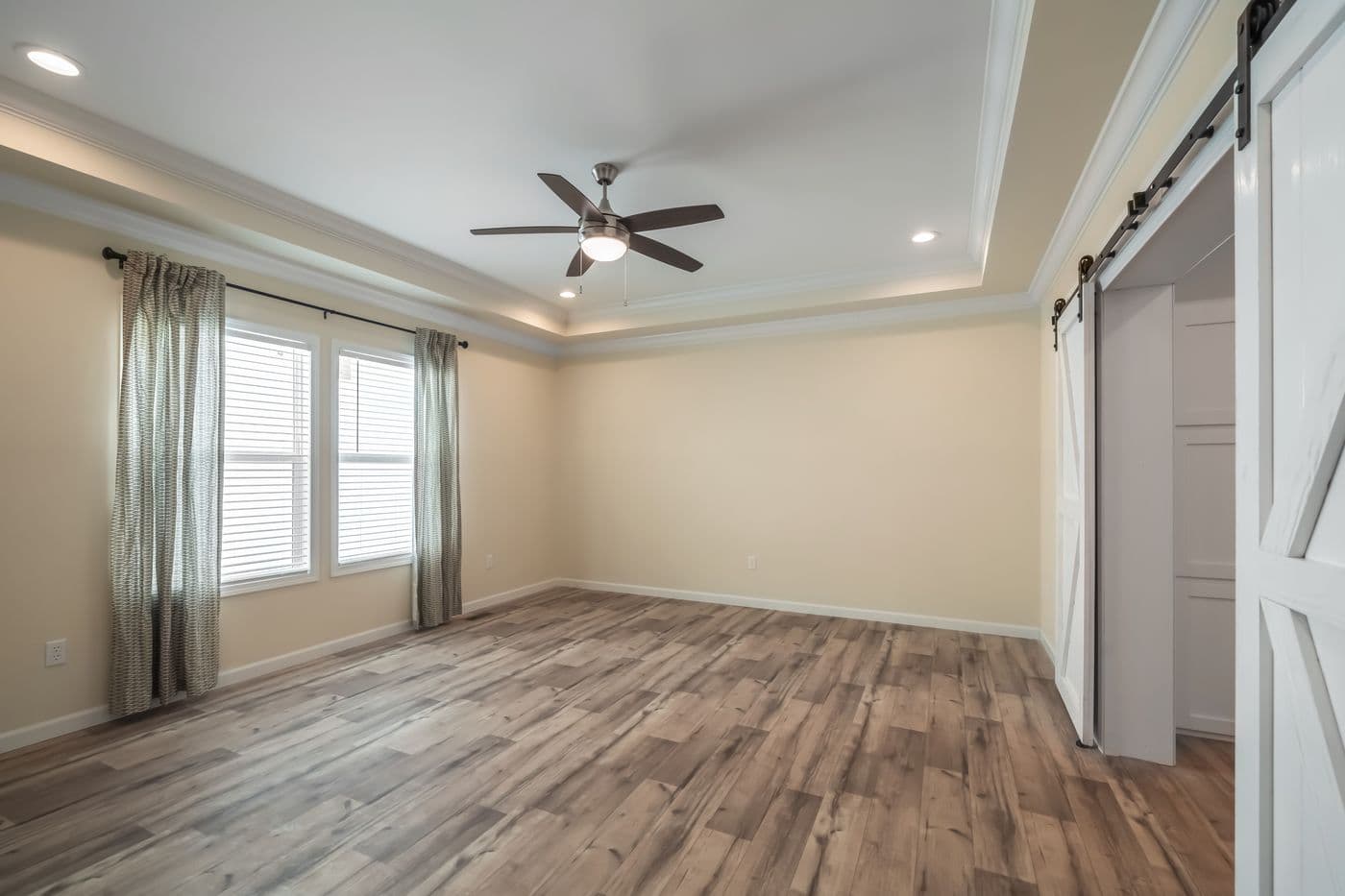 The SUPER 68 ELITE Primary Bedroom. This Manufactured Mobile Home features 3 bedrooms and 2 baths.