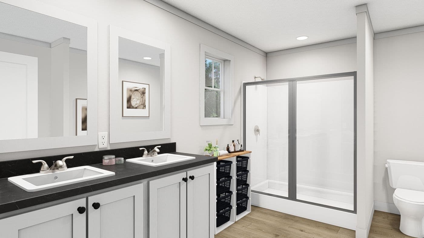 The ROCKET MAN Primary Bathroom. This Manufactured Mobile Home features 3 bedrooms and 2 baths.