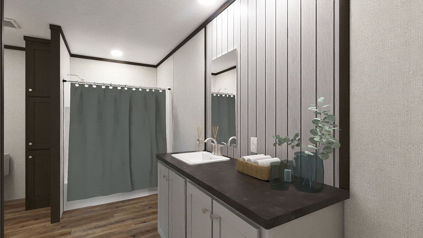 The DISCOVER Primary Bathroom. This Manufactured Mobile Home features 3 bedrooms and 2 baths.