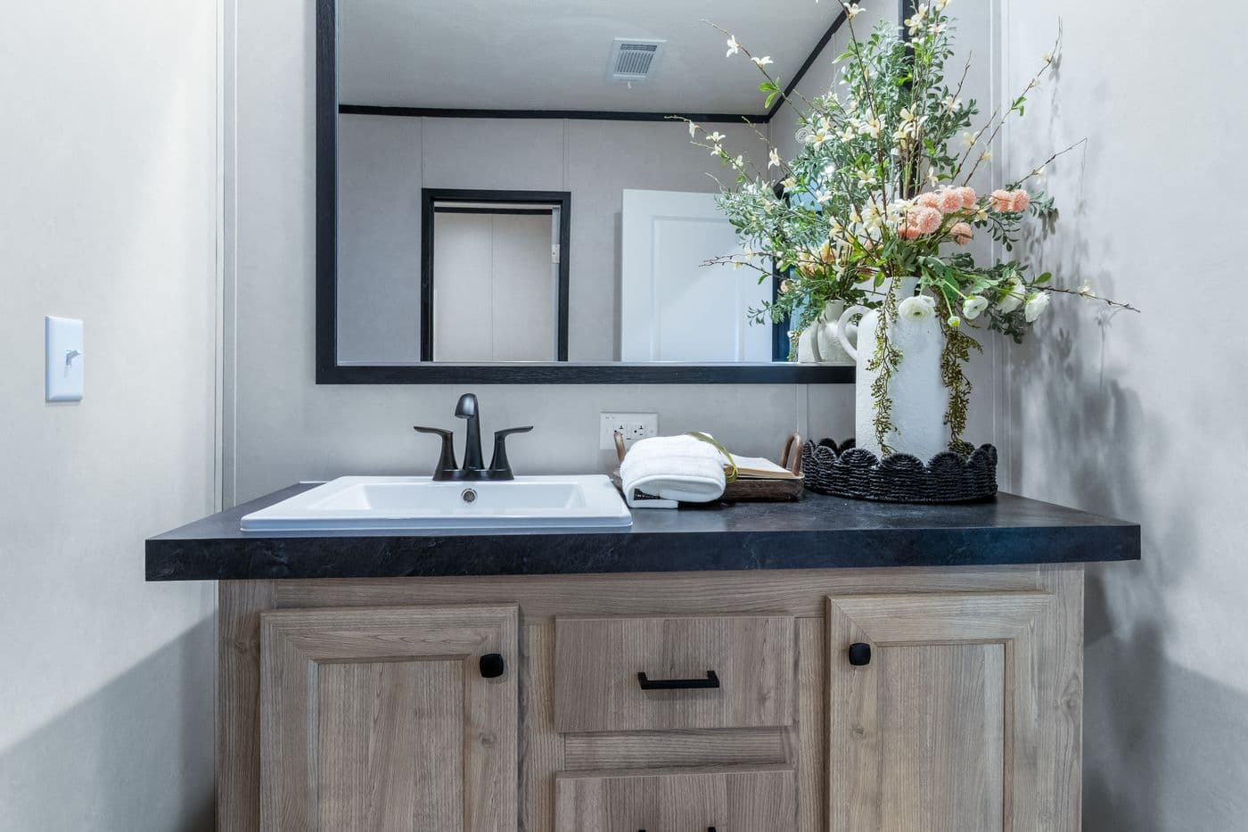 The ODYSSEY Guest Bathroom. This Manufactured Mobile Home features 4 bedrooms and 2 baths.