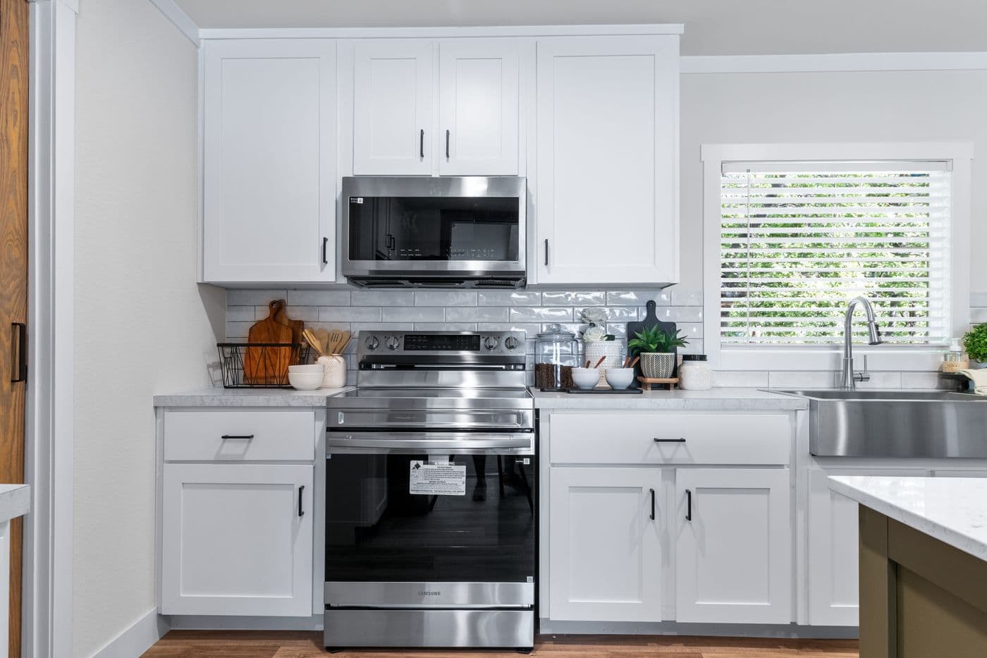 The FARM 4 FLEX ELITE Kitchen. This Manufactured Mobile Home features 4 bedrooms and 3 baths.