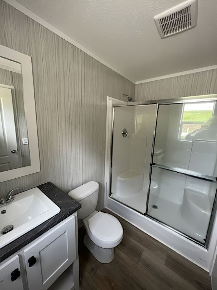 The JADE 40 Guest Bathroom. This Manufactured Mobile Home features 2 bedrooms and 2 baths.