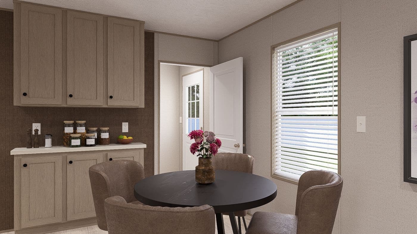 The BLAZER 66 B Dining Room. This Manufactured Mobile Home features 3 bedrooms and 2 baths.
