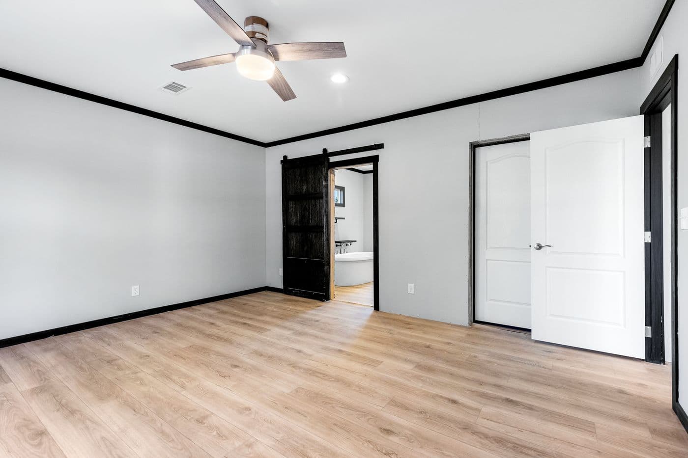 The THE SIERRA Bedroom. This Manufactured Mobile Home features 4 bedrooms and 2 baths.