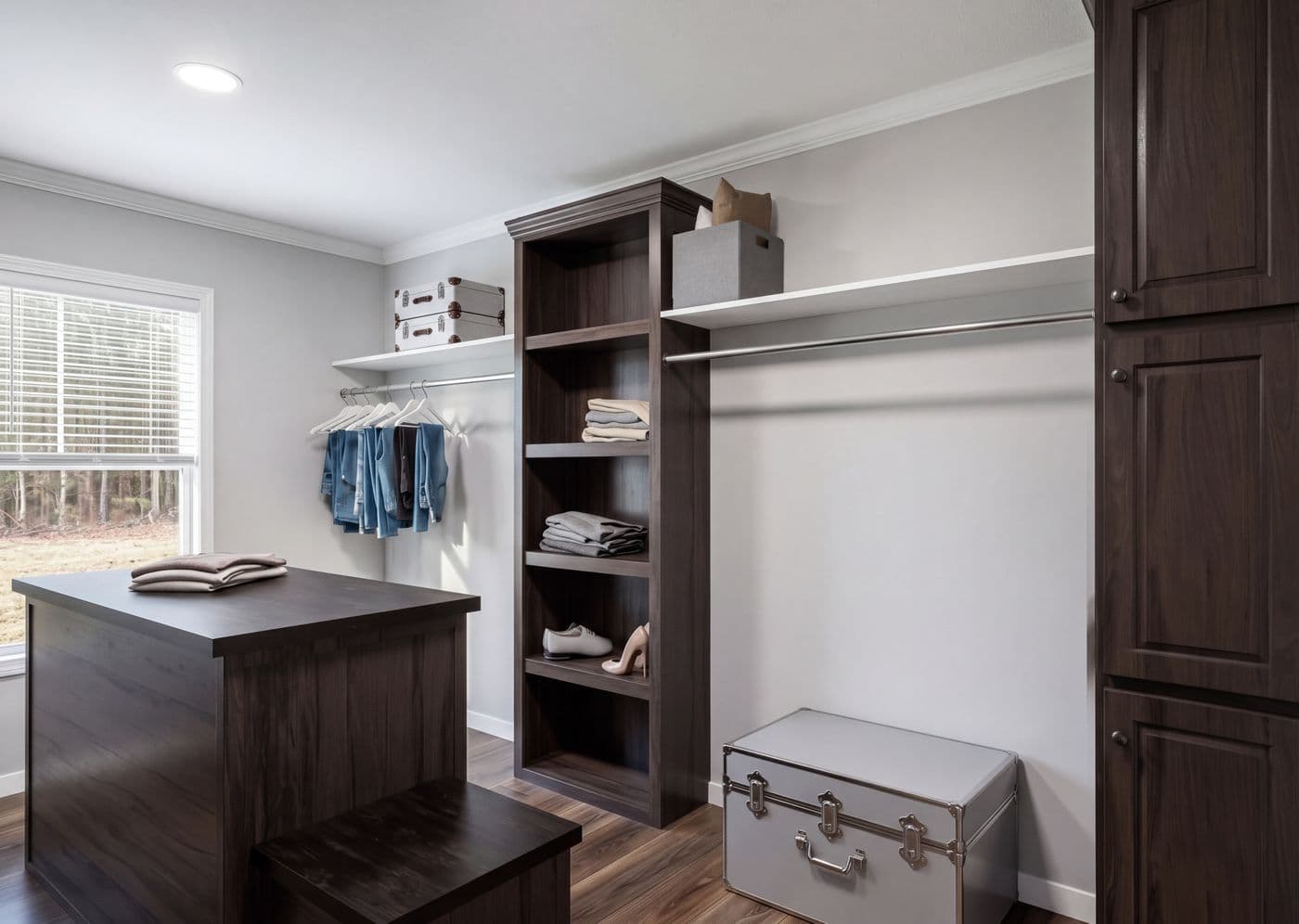 The THE ROOSEVELT Primary Bedroom Closet. This Manufactured Mobile Home features 4 bedrooms and 3 baths.