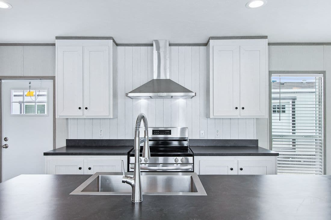 The RESOLUTION 16682X Kitchen. This Manufactured Mobile Home features 2 bedrooms and 2 baths.
