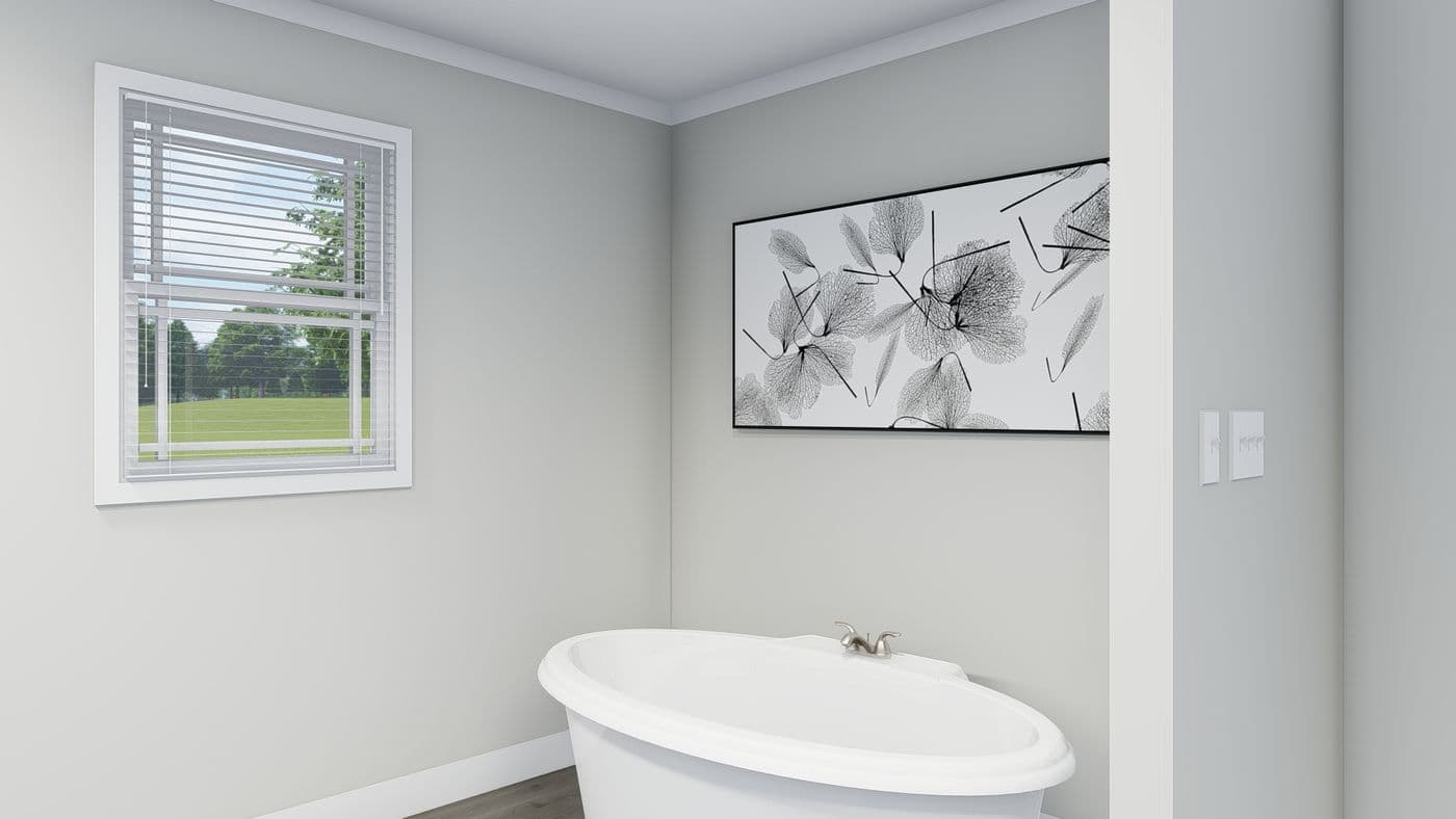The THE BREEZE Primary Bathroom. This Manufactured Mobile Home features 3 bedrooms and 2 baths.