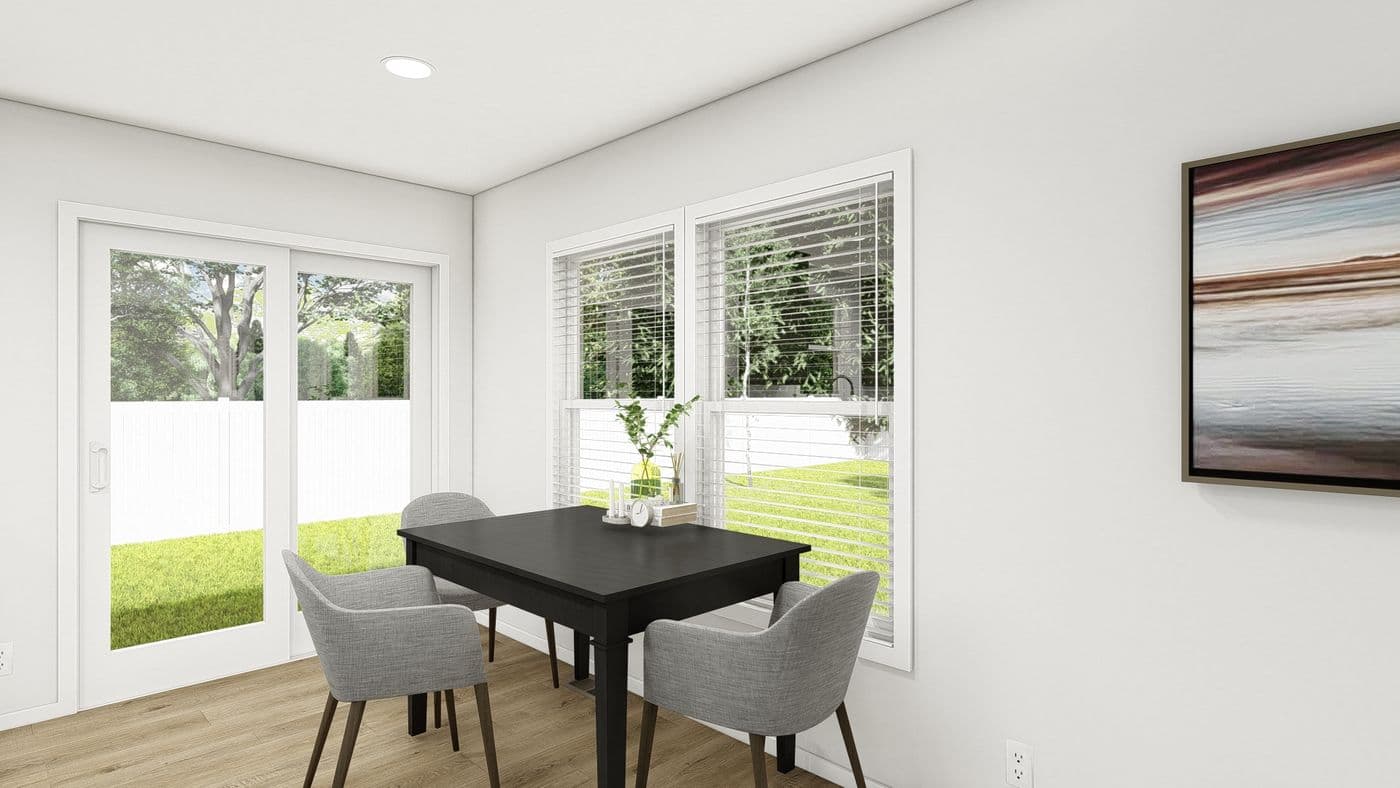 The DRM484F 48'              DREAM Dining Area. This Manufactured Mobile Home features 4 bedrooms and 2 baths.