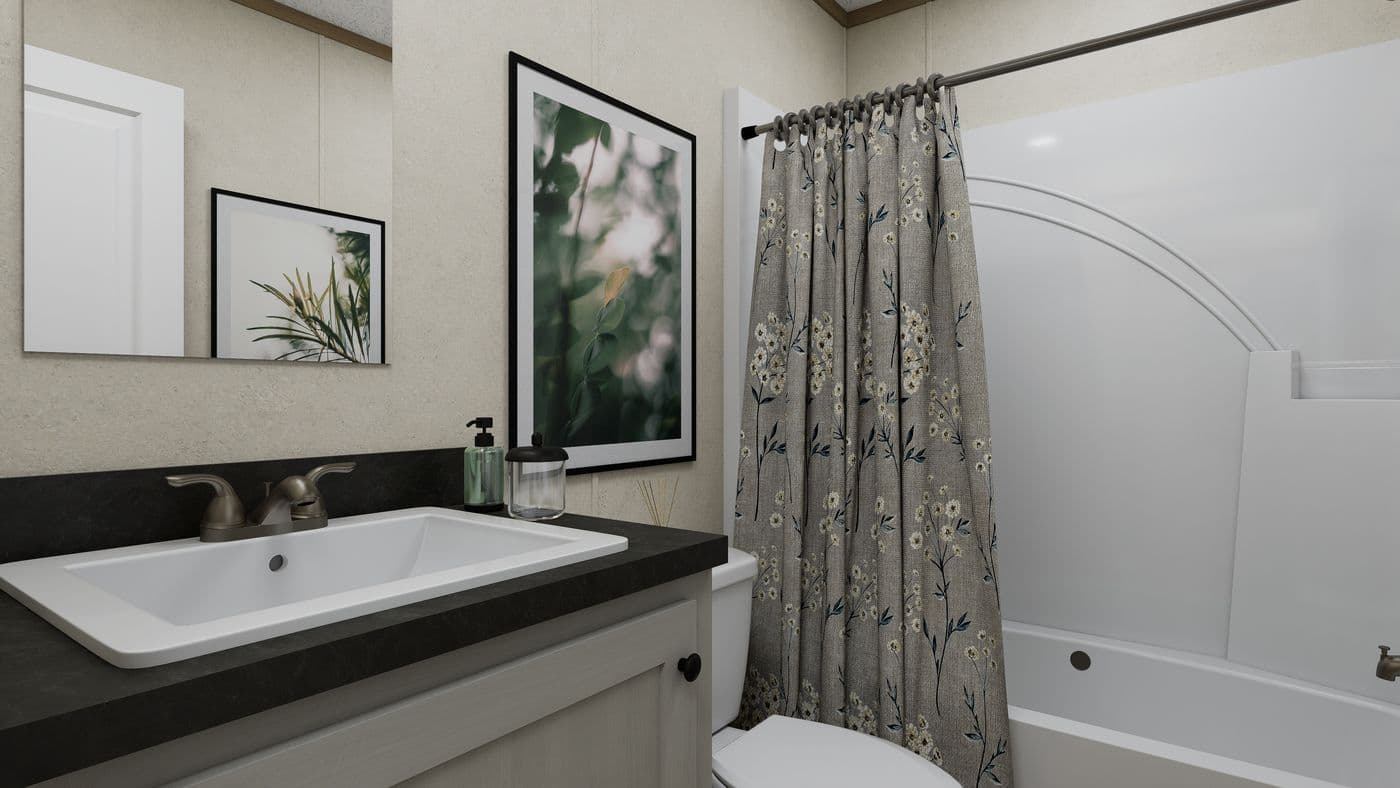 The 7216-CC03 HARBORVIEW 72 Guest Bathroom. This Manufactured Mobile Home features 3 bedrooms and 2 baths.