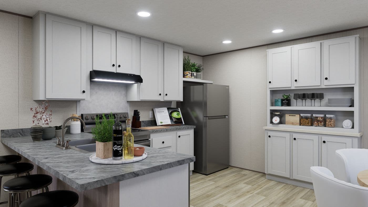 The GLACIER VISTA Kitchen. This Manufactured Mobile Home features 4 bedrooms and 2 baths.