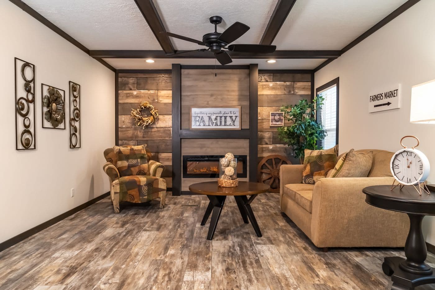 The BOUJEE 2 Living Room. This Manufactured Mobile Home features 3 bedrooms and 2 baths.