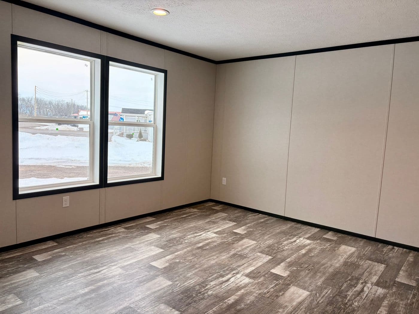 The DIAMOND Living Room. This Manufactured Mobile Home features 3 bedrooms and 2 baths.