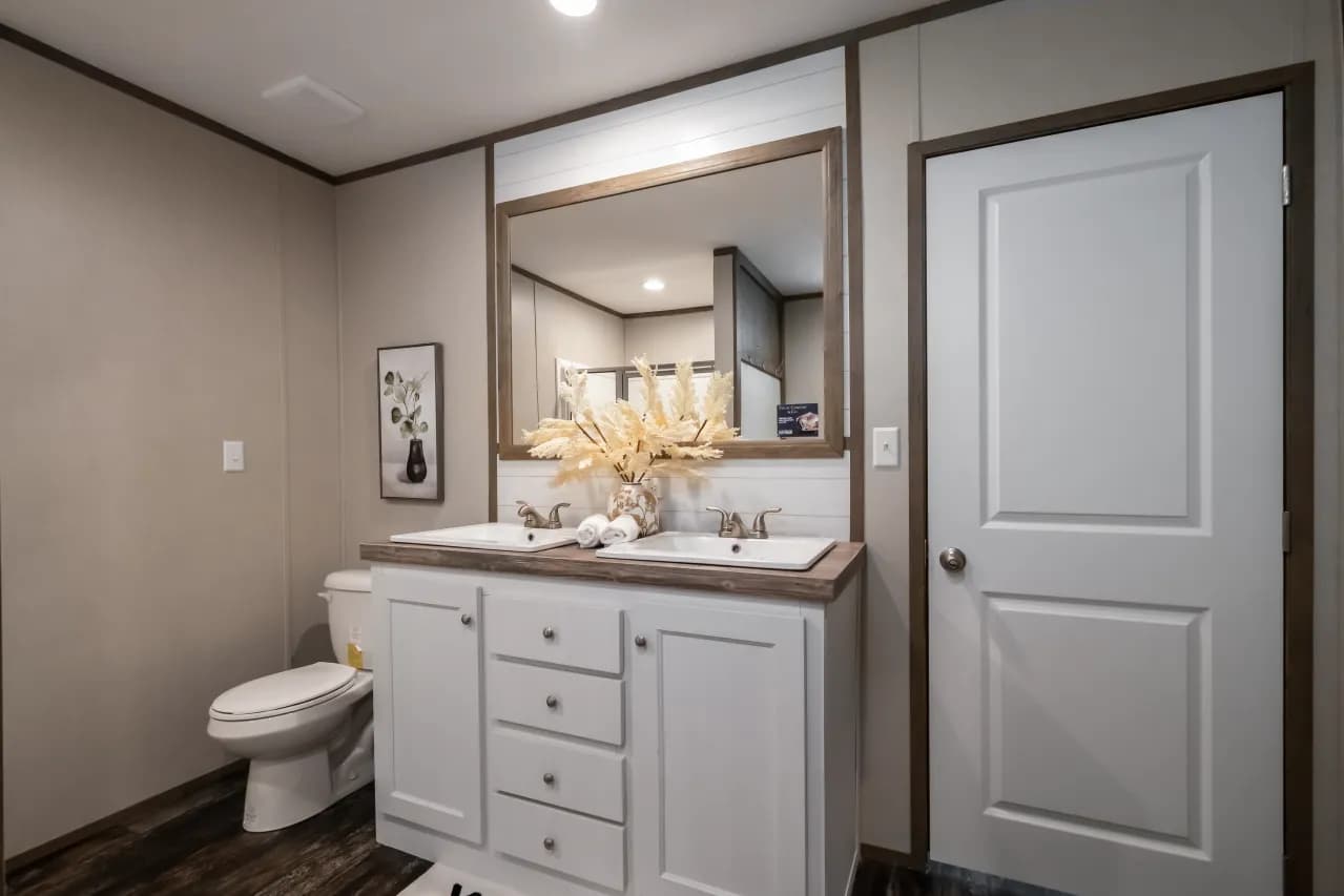 The ANNIVERSARY ENTERTAINER Exterior. This Manufactured Mobile Home features 3 bedrooms and 2 baths.