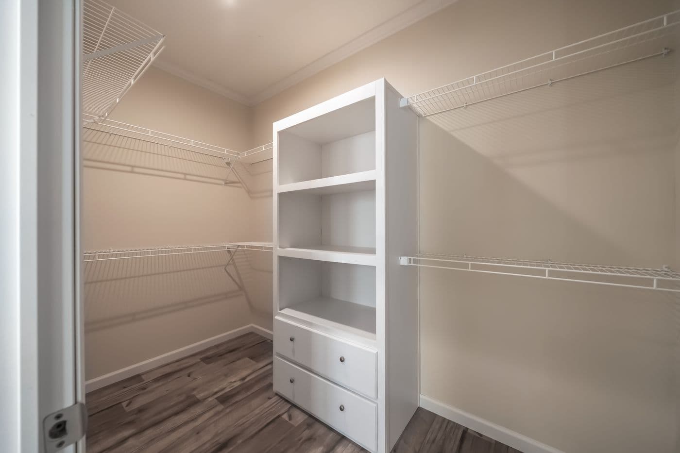 The SUPER 68 ELITE Primary Bedroom. This Manufactured Mobile Home features 3 bedrooms and 2 baths.